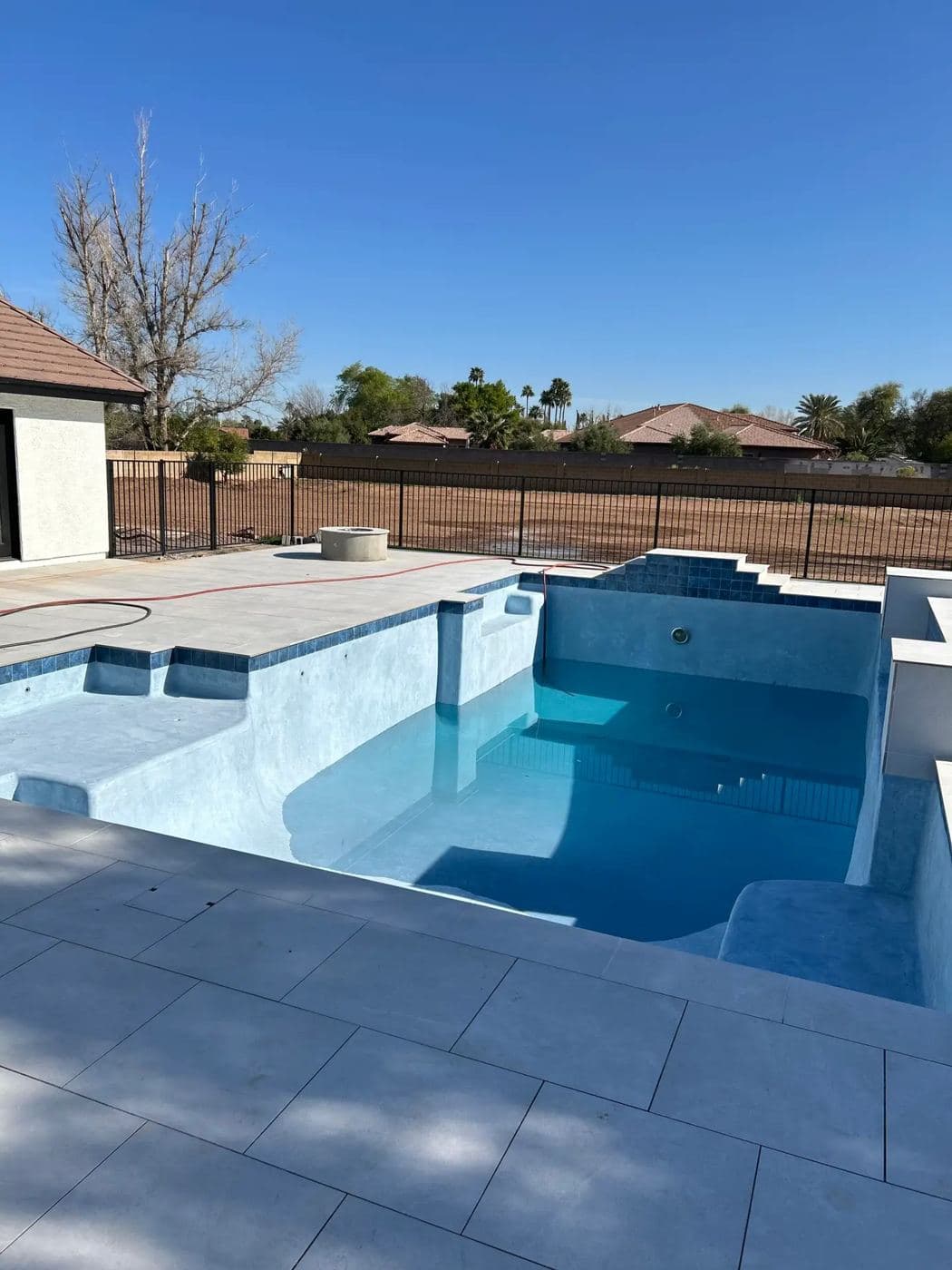 A new pool finish and tiled spa with wide entry steps